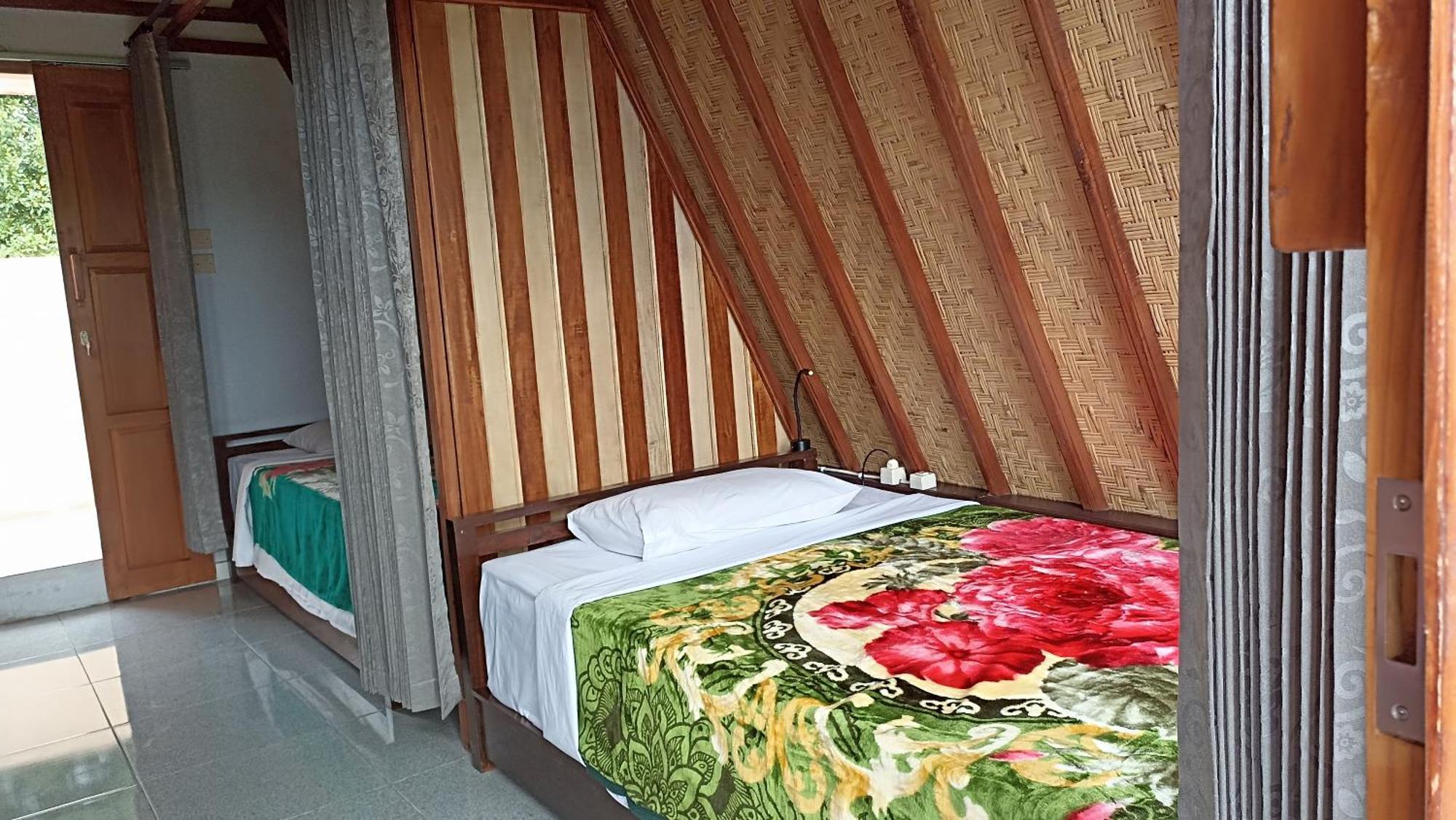 Puri Pilihani Hostel Мундук Номер фото