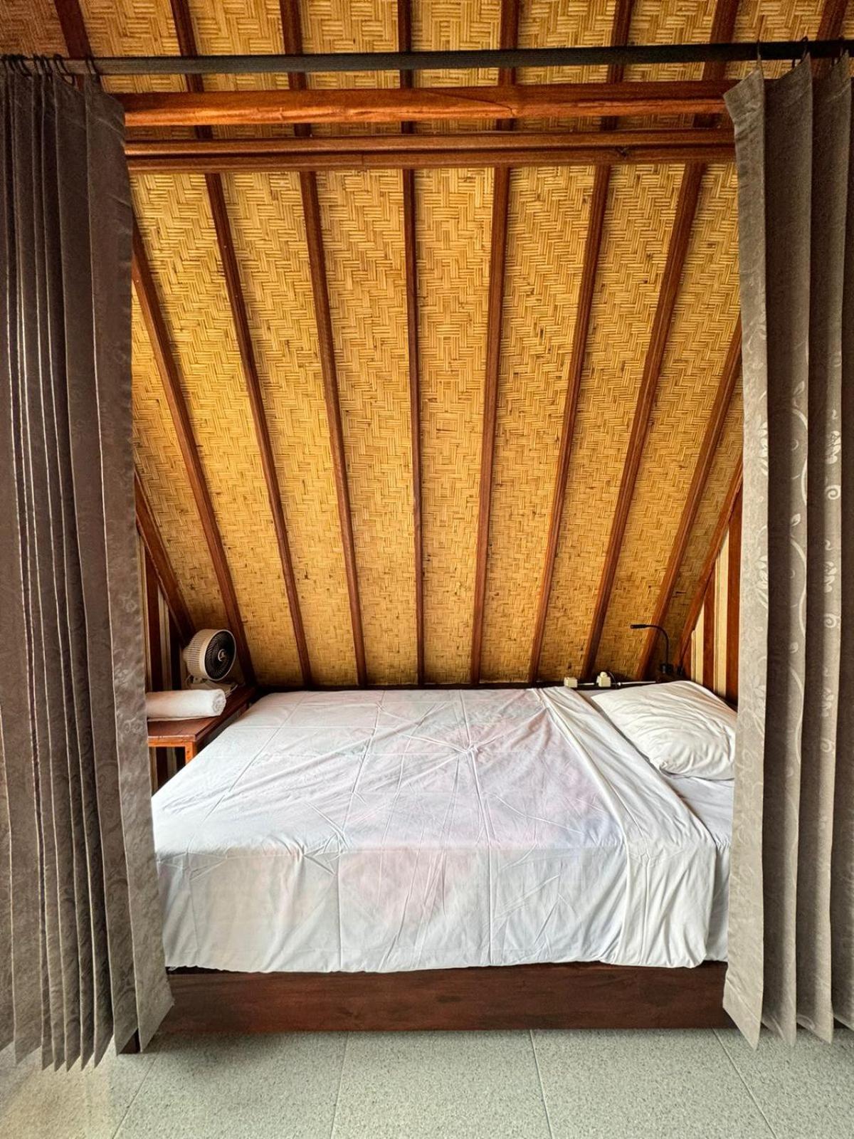 Puri Pilihani Hostel Мундук Номер фото